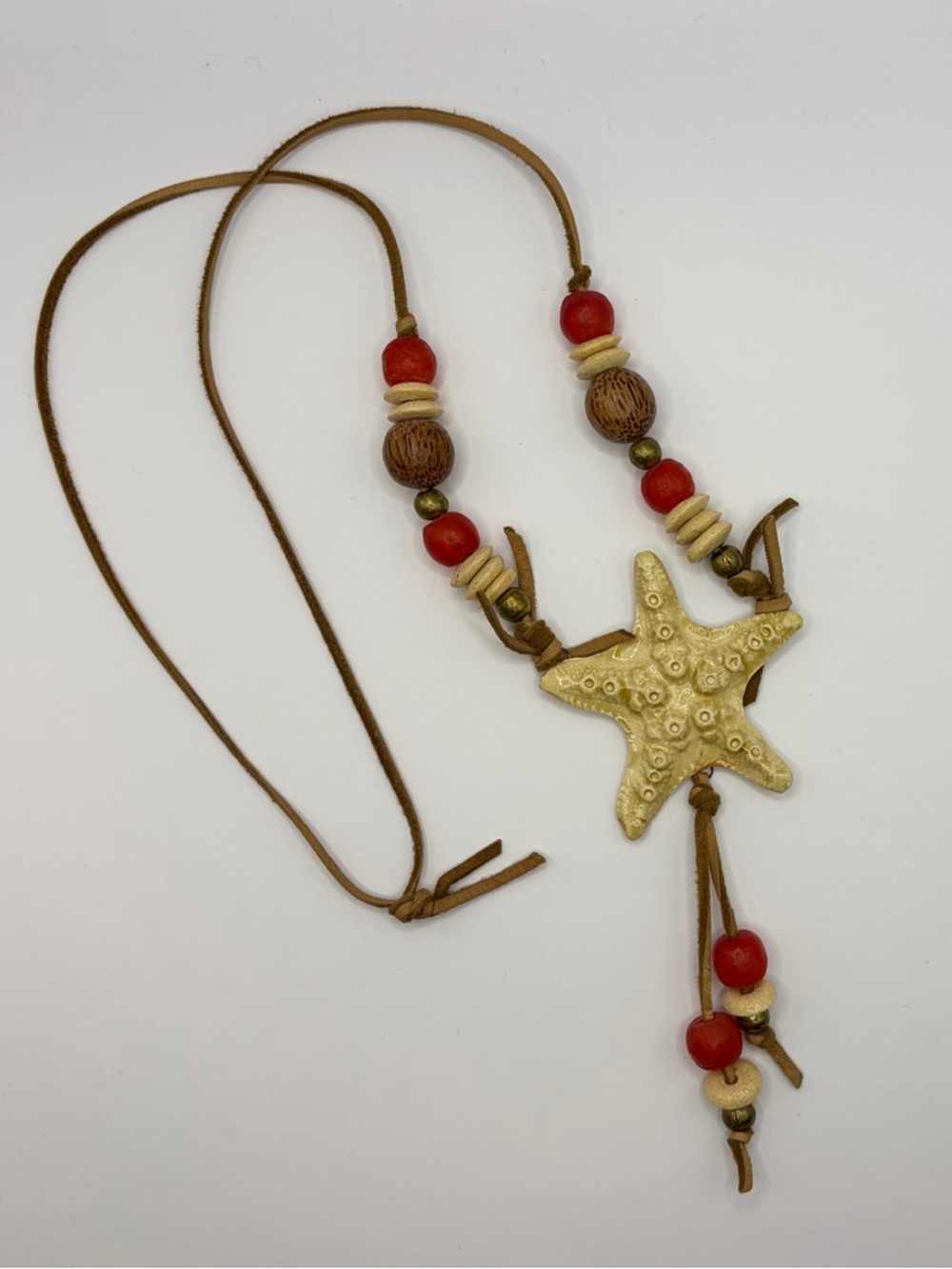 Handcrafted Gold Starfish Pendant Necklace with Red Beads